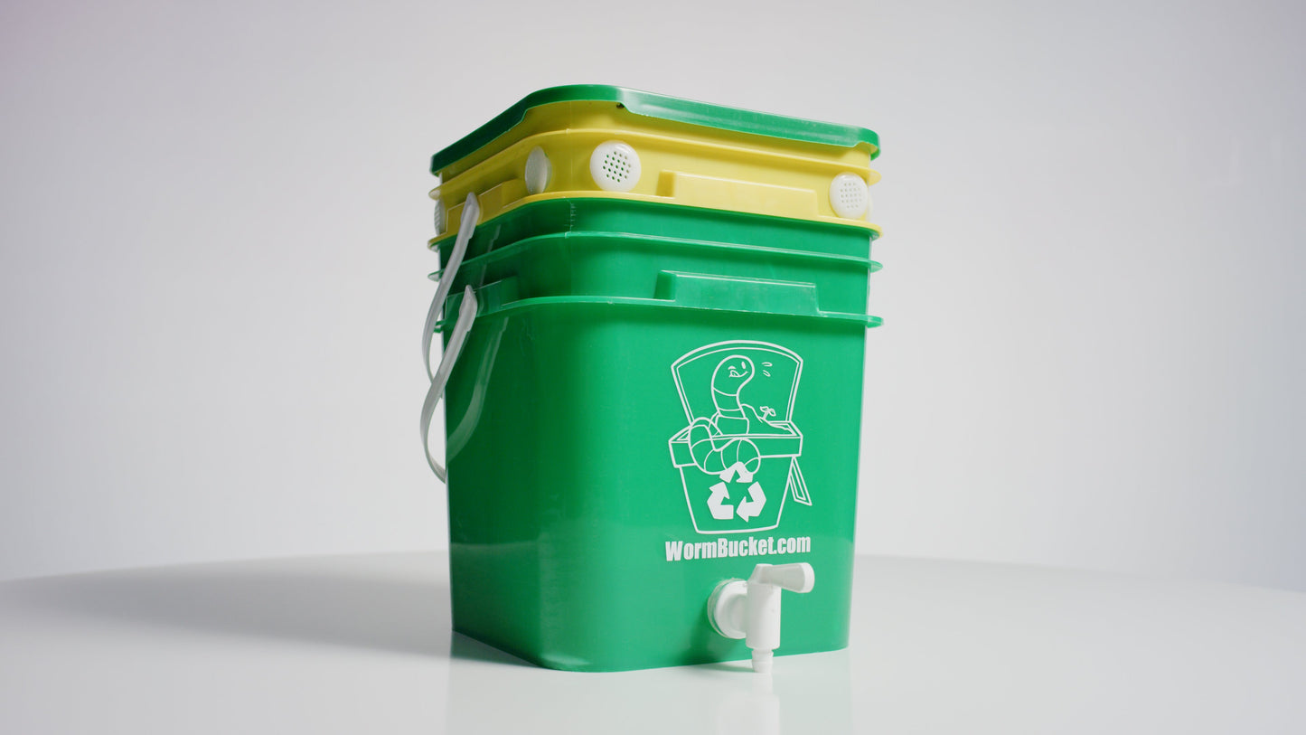 Green and yellow Worm Bucket with a recycling symbol on a white background